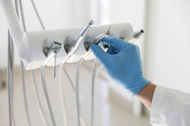 Professional Tooth Extraction technician working in Willis, TX